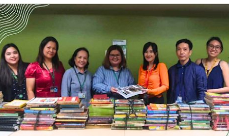 The DLSU Department of Literature Donates 225 books to Tropical Village National High School